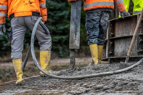 Concreting, concreting the foundation of a wind turbine, concrete pump hose, compressor, more than