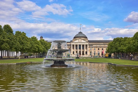 Spa hotel, neo-classical style, architect Friedrich von Thiersch, columns, gardens, trees, lawn,