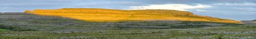 Sunset over the karst landscape of the Burren, Keelhilla, Carran, County Clare, Ireland