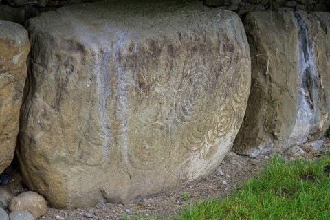 Decorated wall stone at the Knowth megalithic complex, Mellifont, County Meath, Ireland