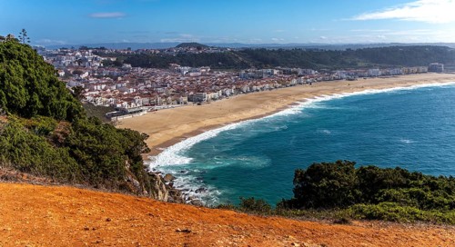 View from Leuct Tower towards orange tiled roofs in the town of Nazare, Estremadura, Portugal