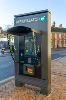 JCDecaux modern public access defibrillator station kiosk communication hub, town centre of