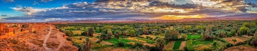 Impressive oasis landscape at sunset with a sky full of clouds, Tinghir in Morocco