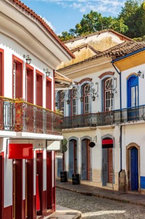 Old mansions and cobblestone paving on the historic streets of Ouro Preto, Ouro Preto, Minas
