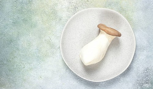 Fresh eringi mushrooms, raw, royal oyster mushrooms, three pieces, Asian cuisine, no people