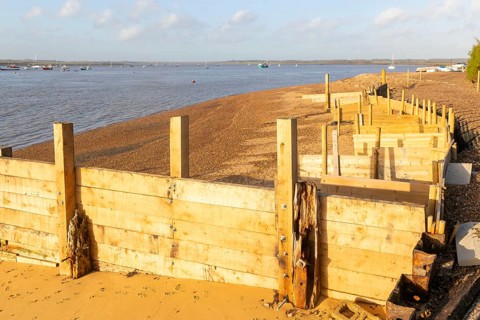Temporary coastal defences erected by Bawdsey Haven Yacht Club, response to rapid erosion beach