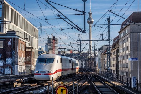Railway line in Berlin, east of Friedrichstraße station, looking east, Berlin TV tower, ICE train