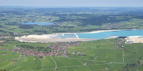 Panorama in spring from Tegelberg, 1881m, of Schwangau, Waltenhofen, Hopfensee and the partly still