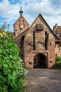 The entrance portal on the city wall of the historic town of Riquewihr, Ellsass