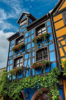 Decorated timber-frame house in the historic old town of Riquewihr, Ellsass