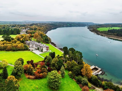 Autumn over Plas Newydd House from a drone, Gardens and Parkland, Llanfairpwllgwyngyll, Anglesey,