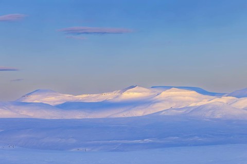 Snow covered mountains in Arctic landscape at Mohnbukta, bay at the western shore of Storfjorden in