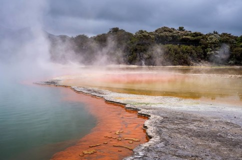 The champagne pool in the Waiotapu geothermal area (Wai-O-Tapu) . orange and yellow. Waiotapu,