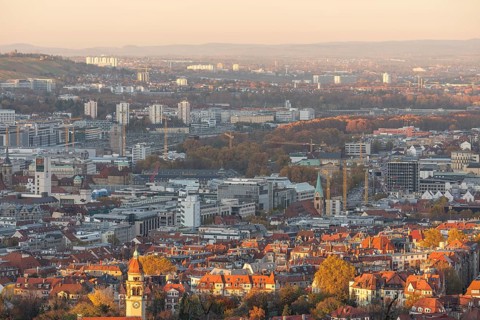 View of the city center in warm sunset light from Santiago de Chile Platz Stuttgart, Germany