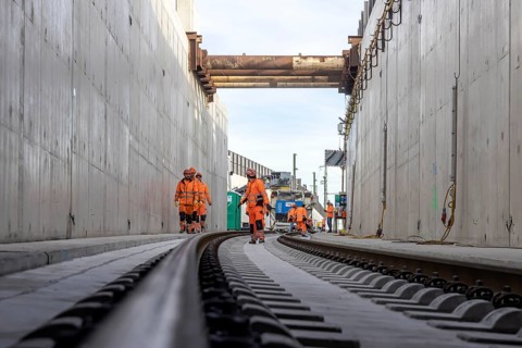 Construction work on the airport tunnel at the airport tunnel. The last few meters of solid road