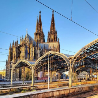 Central station with platform roof and cathedral early in the morning, Cologne, Rhineland, North