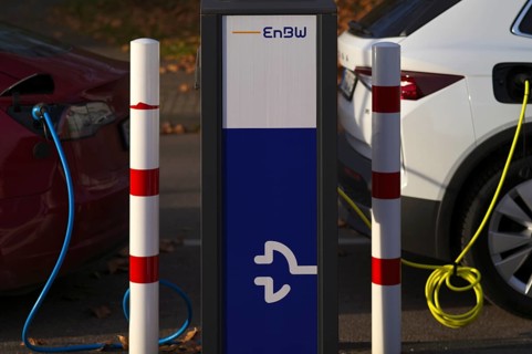 Parking lot with gas pump, EnBW charging station for electric cars, charging station, e-charging