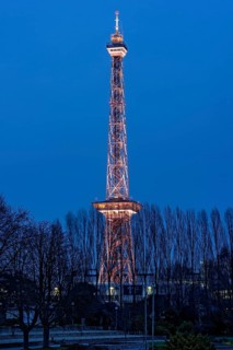 Red illuminated Berlin radio tower, half-timbered steel building by architect Heinrich Straumer,