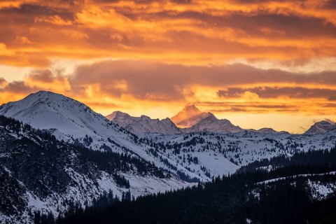 Grossglockner peaks at sunset in winter, spectacular cloudy skies, Hochbrixen, Brixen im Thale,