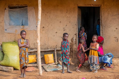Villagers in a traditional village, mud huts, Sadaani, Tanzania