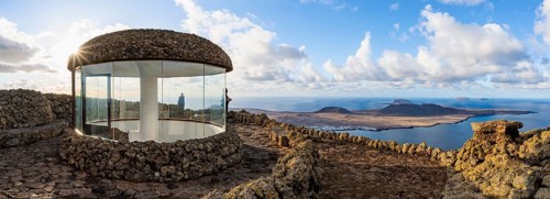 Stairway and viewing platform at the Mirador del Río viewpoint, in the evening light with sun