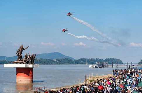 Indian Air Force (IAF) ALH Mk1 Sarang helicopters soar through the sky during an air show as part