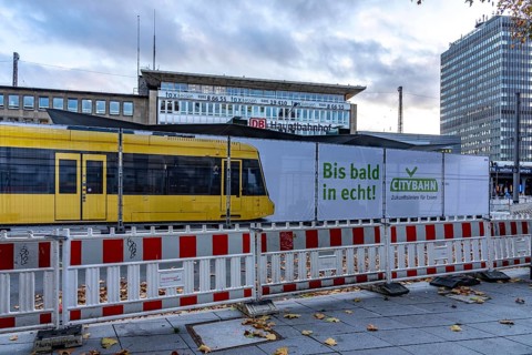 Construction site of the stop at the main train station, for the new city railway, visualization of