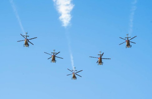 Indian Air Force aerobatic team performs during rehearsals ahead of the air show organised as part