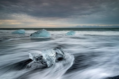 Beach with waves, ice formations, Diamont Beach, Jökulsarlon, Iceland