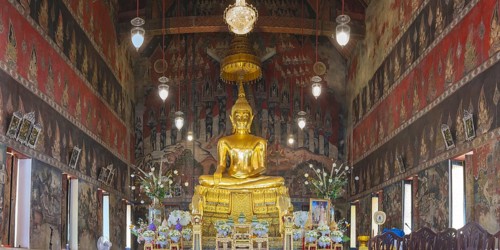 Golden Buddha statue with Bhumispara mudra, Buddha Gautama at the moment of enlightenment,
