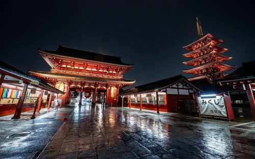 Illuminated five-story pagoda and Hozomon treasure chamber gate of Asakusa Shrine or Senso-ji