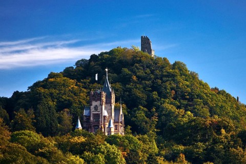 The mountain Drachenfels with Drachenburg Castle and the castle ruins, Siebengebirge, Königswinter,