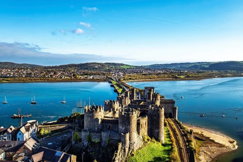 Conwy Castle over River Convy from a drone, Convy, North Wales, England, United Kingdom