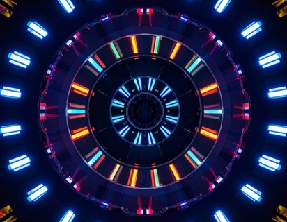 Abstract background of slightly unfocused multicolored glass lenses spinning and rotating,