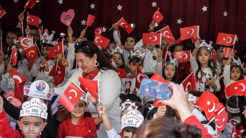 Children celebrate the 102nd anniversary of the Republic Day of Turkey, a national holiday
