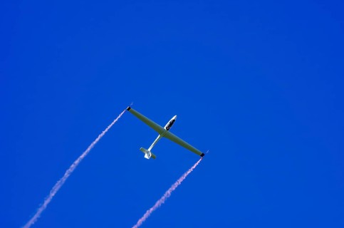 An SZD-59-1 ACRO glider, registration D-1138, during a demonstration as part of an air show at the