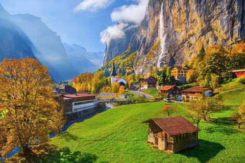 View of town and valley with Staubbach waterfall in autumn, Lauterbrunnen, Bernese Oberland, Canton