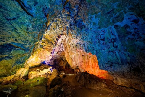 Coloured lighting, fog cave, stalactite cave in the Swabian Jura, stalactites, stalactite forest,