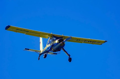 A PZL-104 Wilga-35A sport aircraft from Fliegerklub Kamenz with registration D-EWRZ during a flight