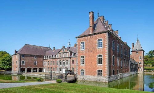 16th century Classicist Château de Franc-Waret in Louis XV style, moated castle in the village