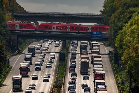 Local train crossing the A3 motorway between the Hilden junction and the Mettmann junction, view to
