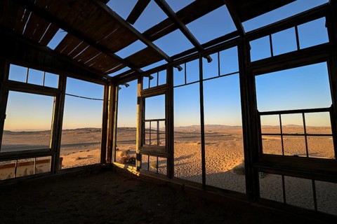 View from a former dwelling house into the desert, Kolmanskop, restricted diamond area, Karas