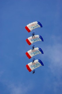Parachutists during an aerial acrobatic demonstration as part of an air show on the Rossfeld in