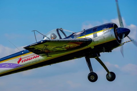 A Jakovlev Jak-55 with the registration LY-AGL during a flight demonstration as part of an air show