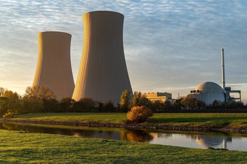 View across the Weser to the cooling towers of the Grohnde nuclear power plant in the morning