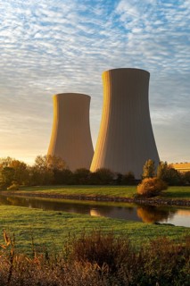 View across the Weser to the cooling towers of the Grohnde nuclear power plant in the morning