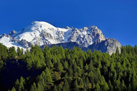 Aiguille des Grands Montets and snow-covered Aiguille Verte, Chamonix-Mont-Blanc, Haute-Savoie,