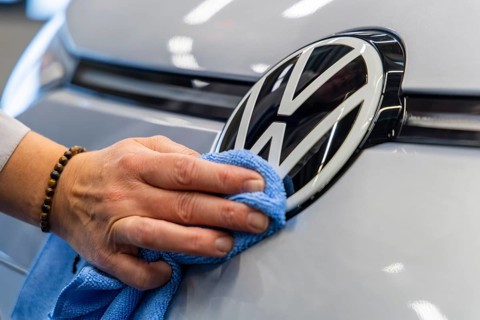 Electric car production in the assembly halls of VW in Zwickau. VW logo, Zwickau, Saxony, Germany