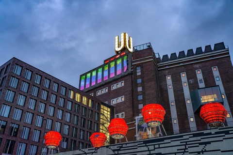 Illuminated sculptures of Dortmund roses in front of Dortmund's landmark U, Centre for Art and