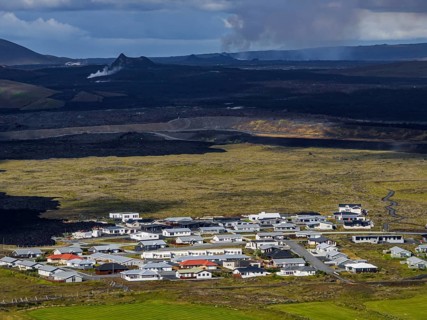 Lava, lava field, village, houses, summer, cloudy, sunny, aerial view, volcanic eruption, July